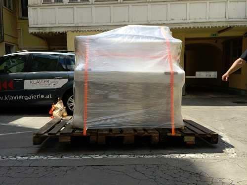 Klaviertransport ins Ausland, sichere Verpackung und Transportsicherung