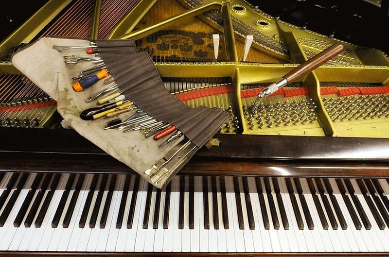 Work on a piano in the workshop